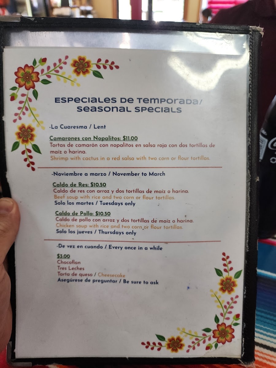 La Sabrosita Taqueria menu board