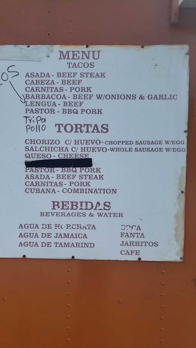 Taquería 'Las chicanitas' menu board