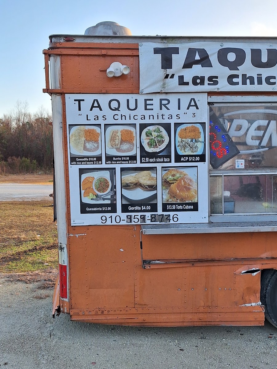 Taquería 'Las chicanitas' menu board
