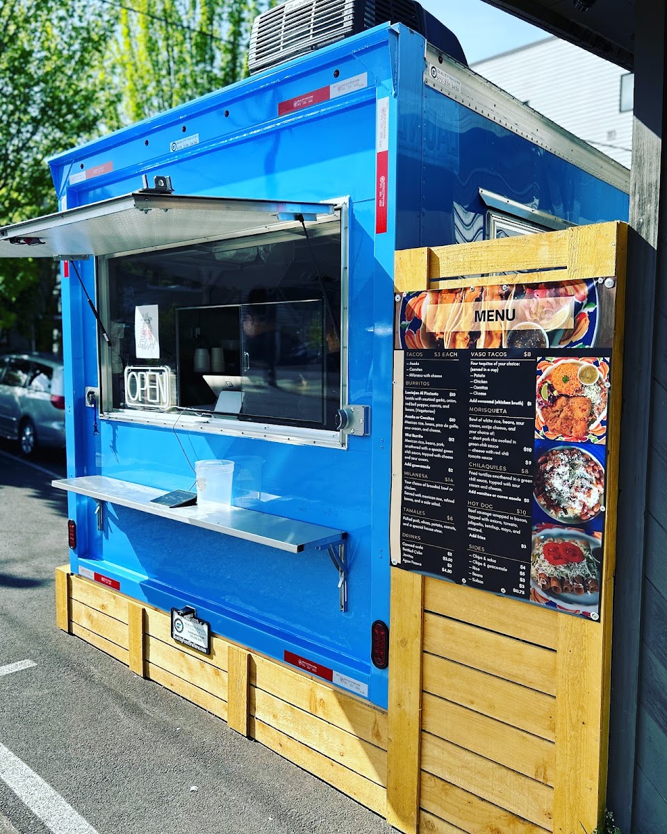 El Chisme Sabroso menu board
