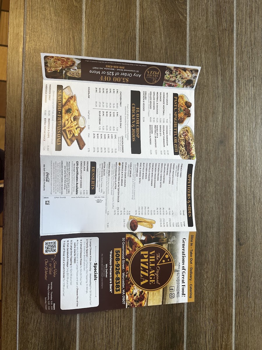 The Original Village Pizza menu board