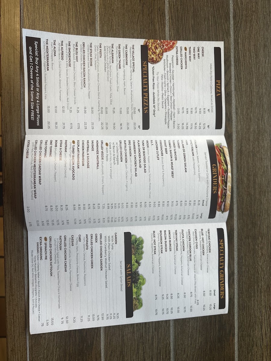 The Original Village Pizza menu board