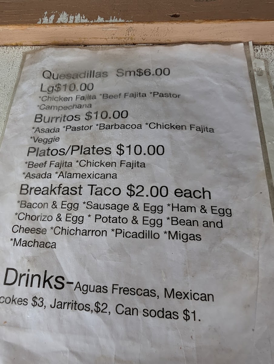 Taqueria Taco Rico menu board
