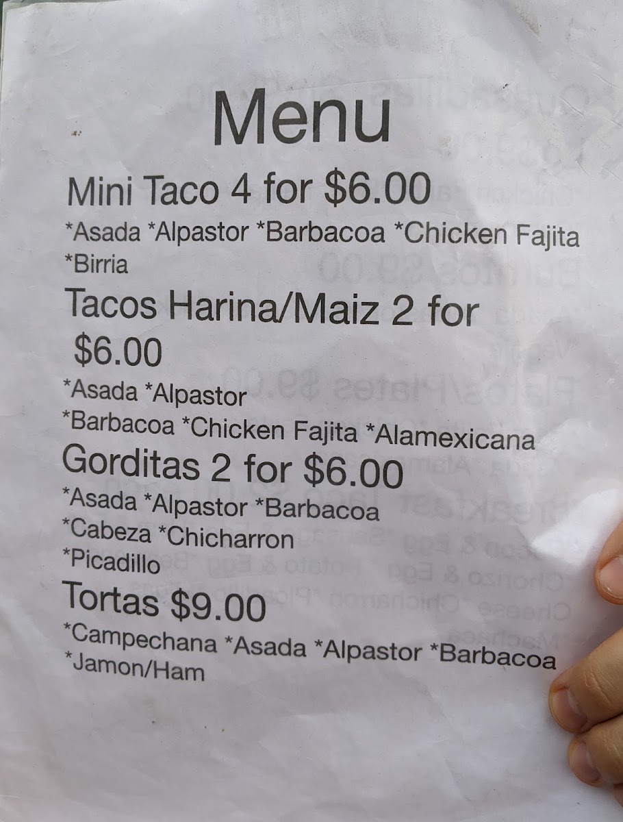 Taqueria Taco Rico menu board