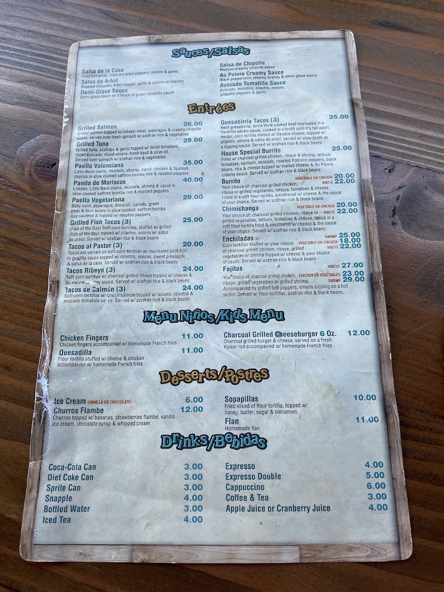 Juanito's Charcoal Grill menu board