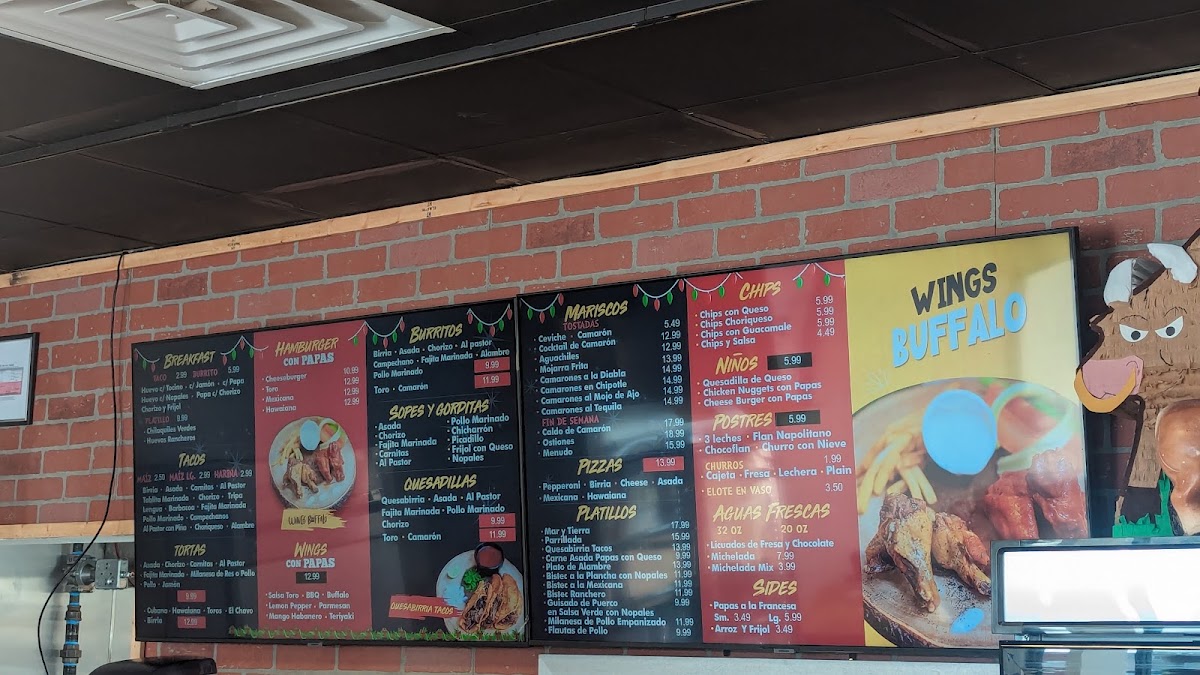 Toros tacos menu board