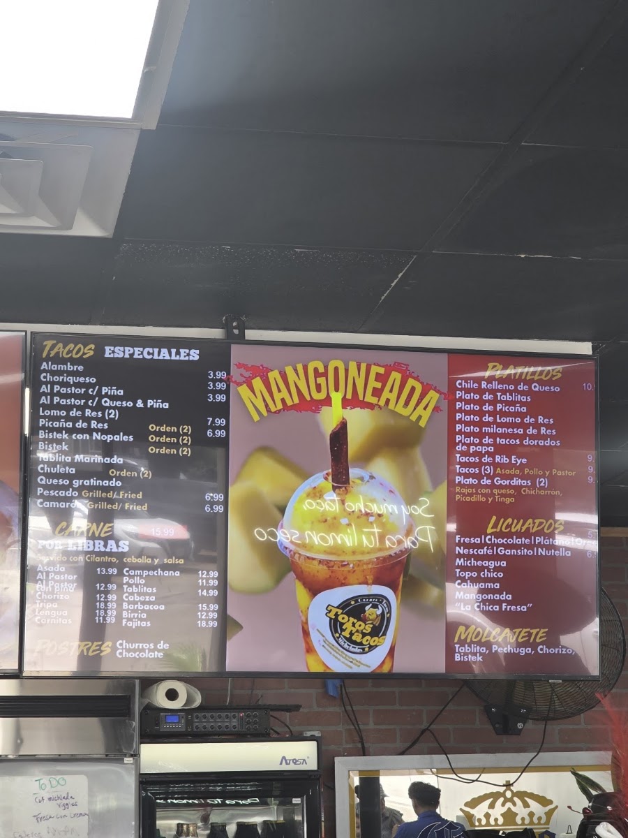 Toros tacos menu board
