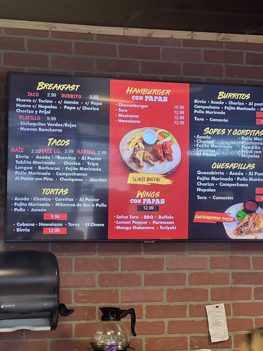 Toros tacos menu board