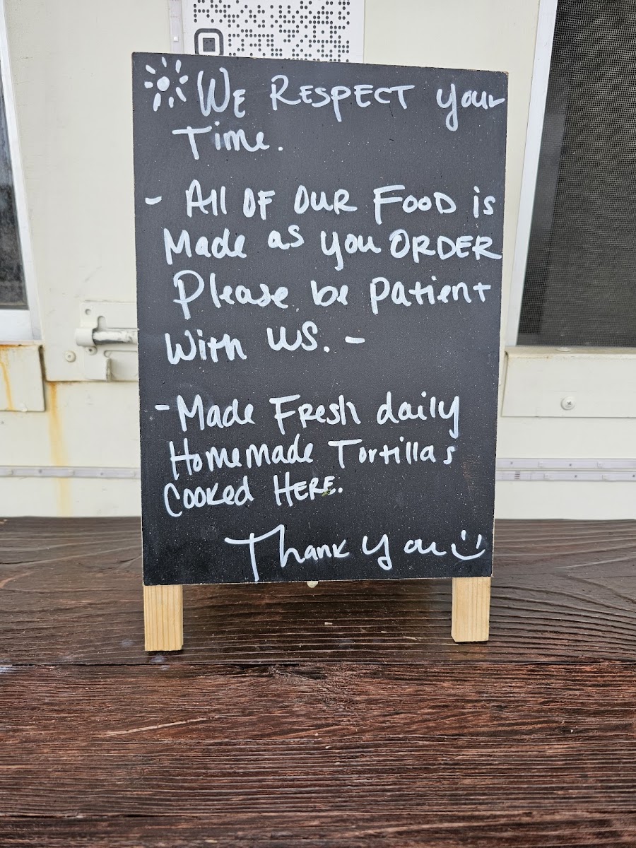 Chavez Tacos menu board