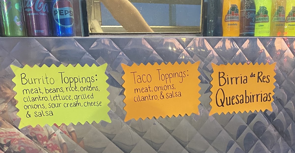 Tacos De La Torre menu board