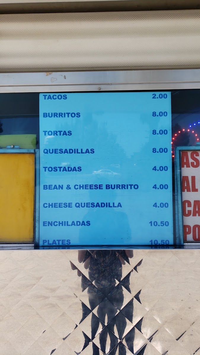 Tacos De La Torre menu board