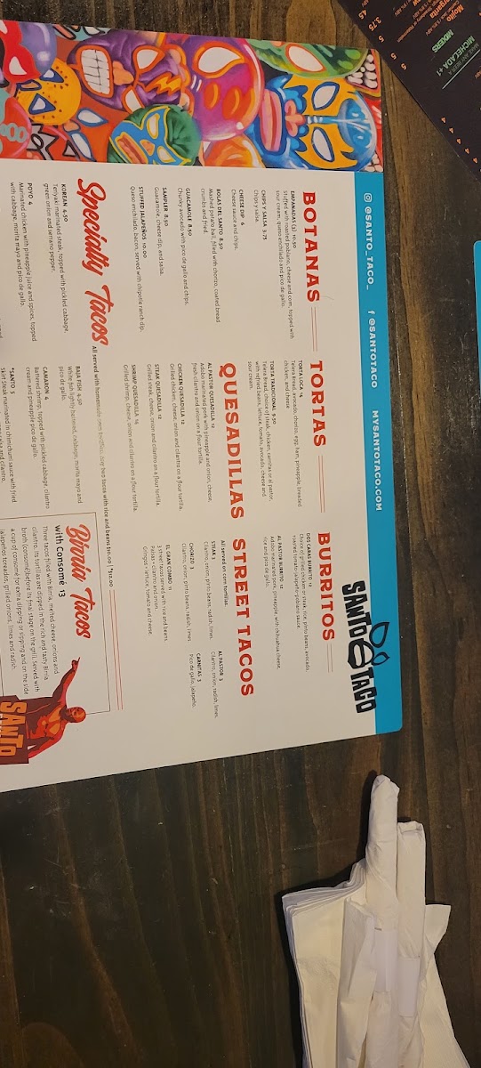 Santo Taco menu board