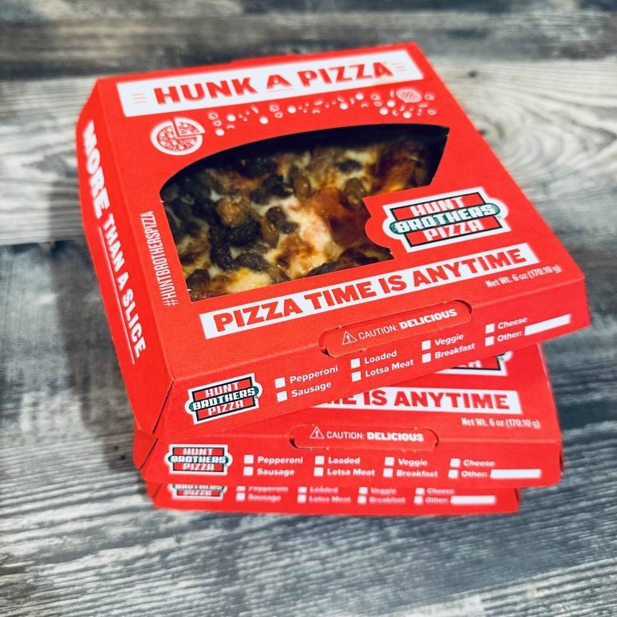 Hunt Brother's Pizza menu board