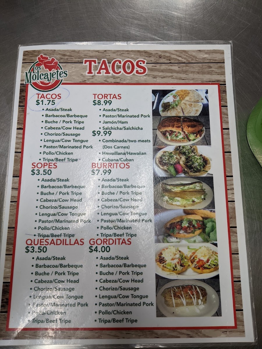 Taqueria Los Molcajetes menu board