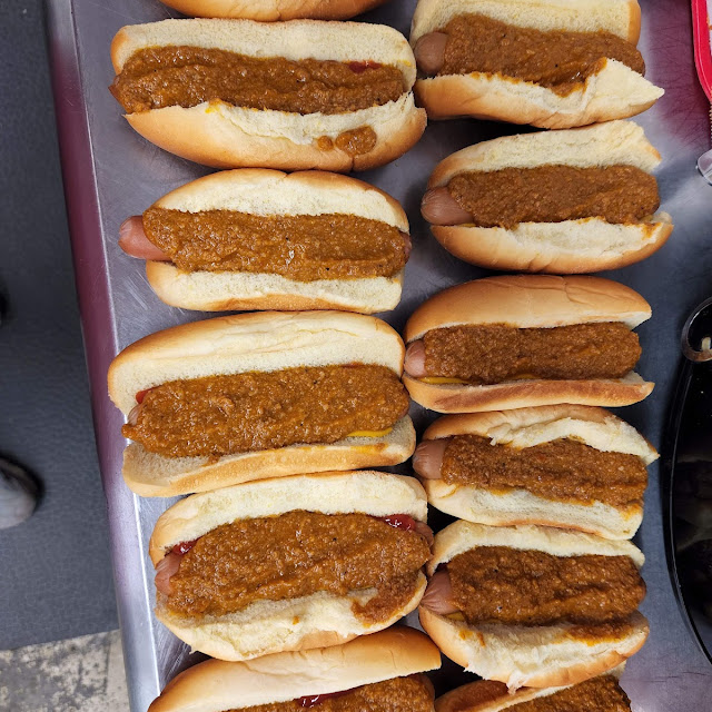 Hot Dog with Ketchup Mustard and Chili