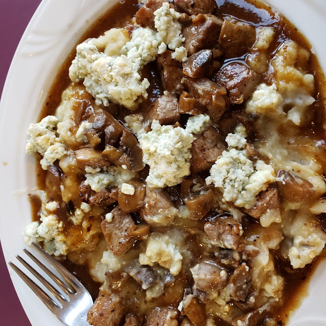 Beef Tips over Mashed with Bleu Cheese