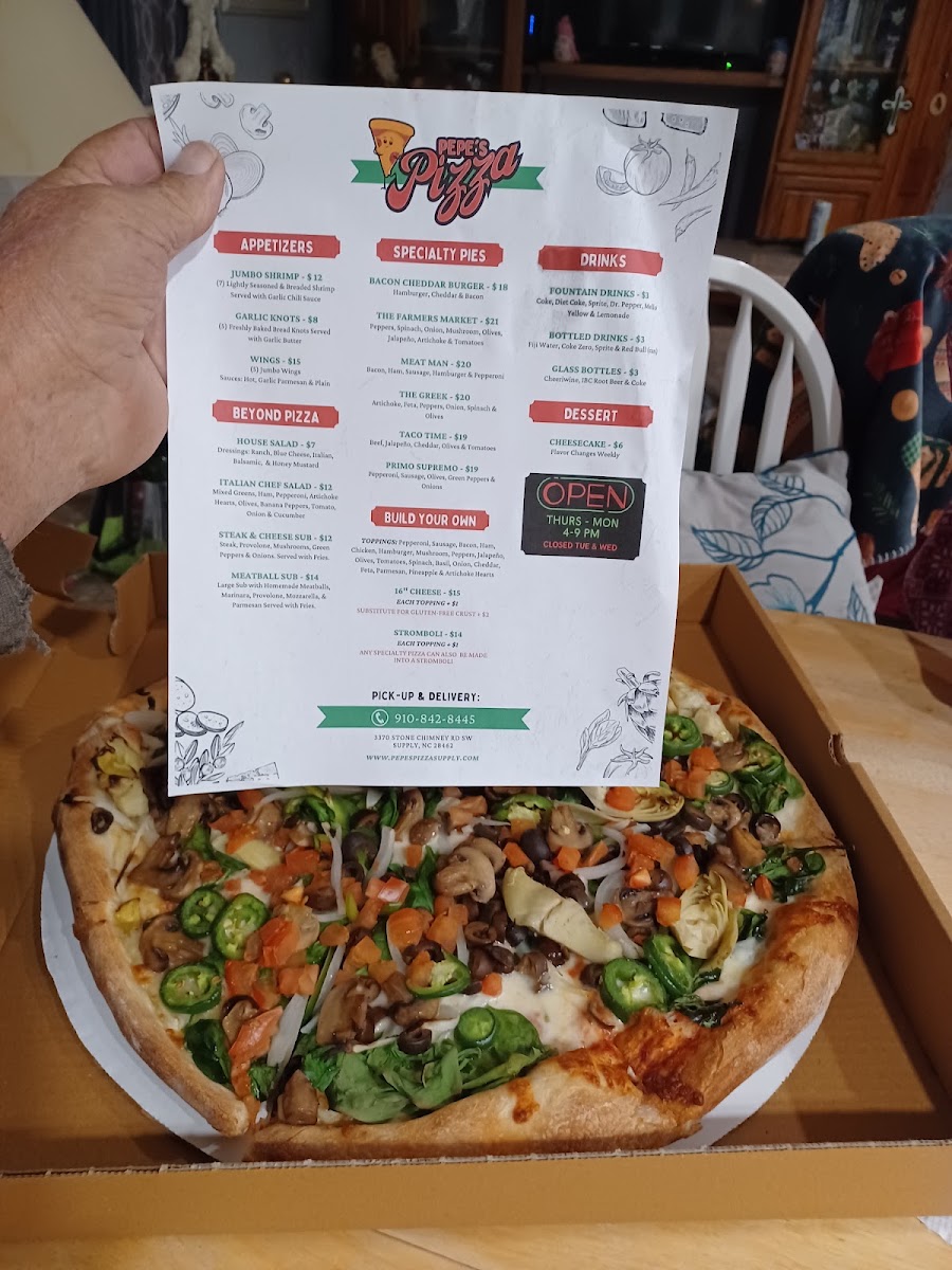 Pepe’s Pizza menu board