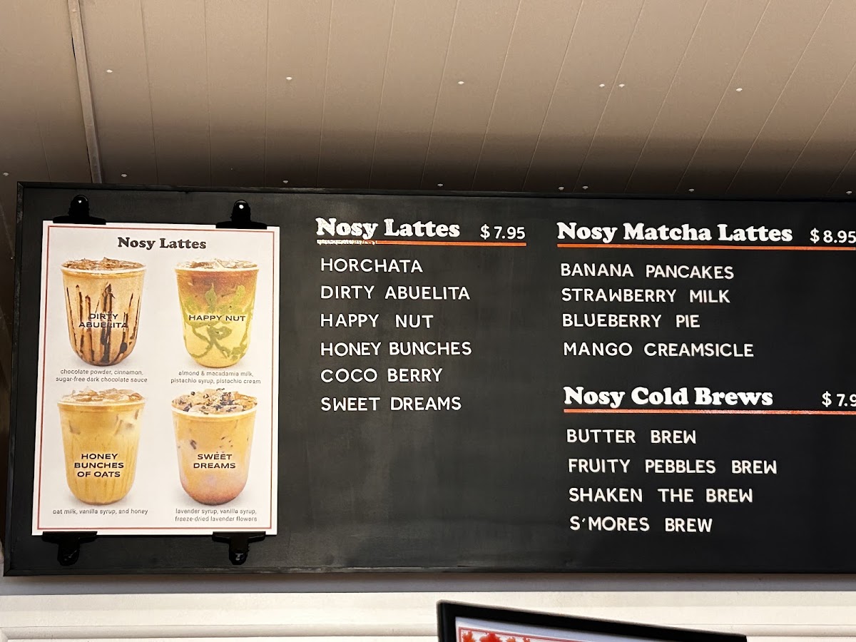 Nosy Neighbors Coffee & Donuts menu board