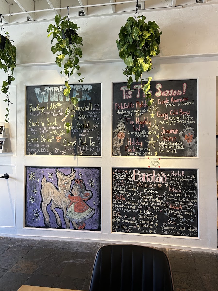 Nosy Neighbors Coffee & Donuts menu board