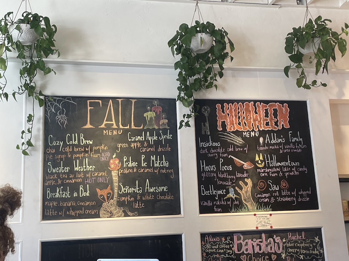 Nosy Neighbors Coffee & Donuts menu board