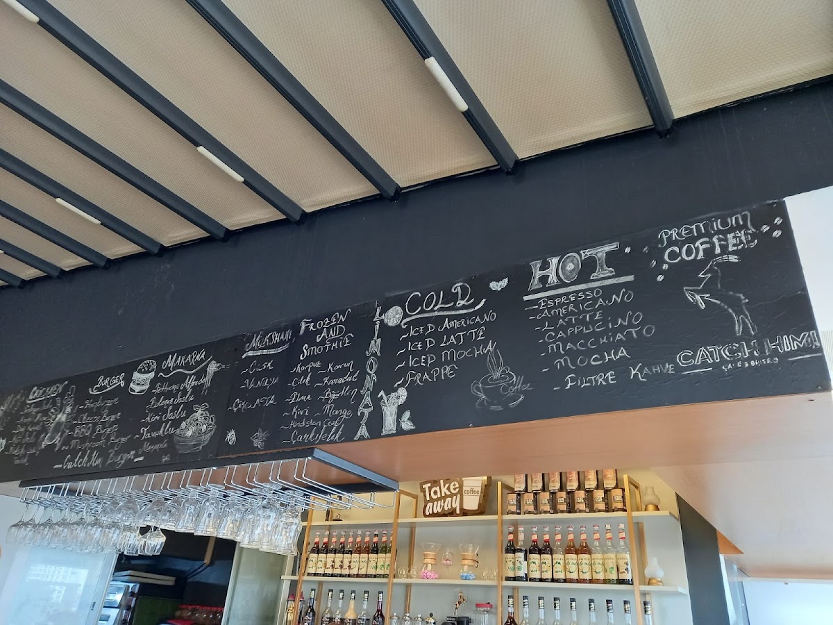 Catch Him! Cafe & Bistro menu board