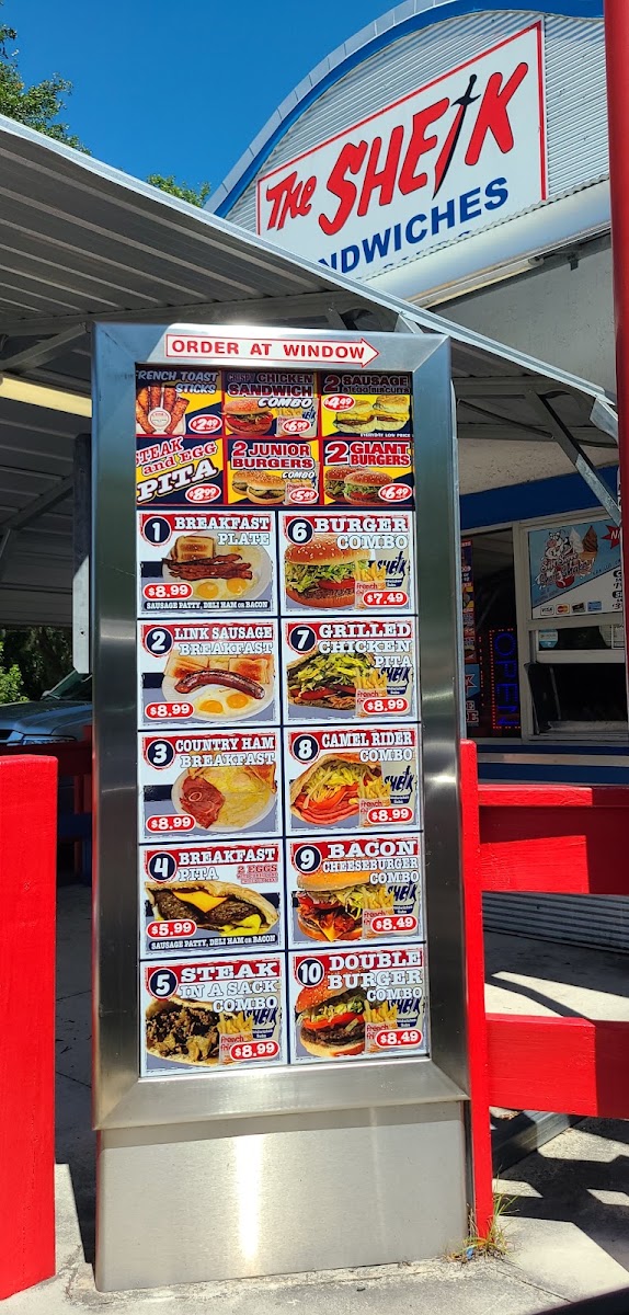 The Sheik Sandwiches and subs menu board