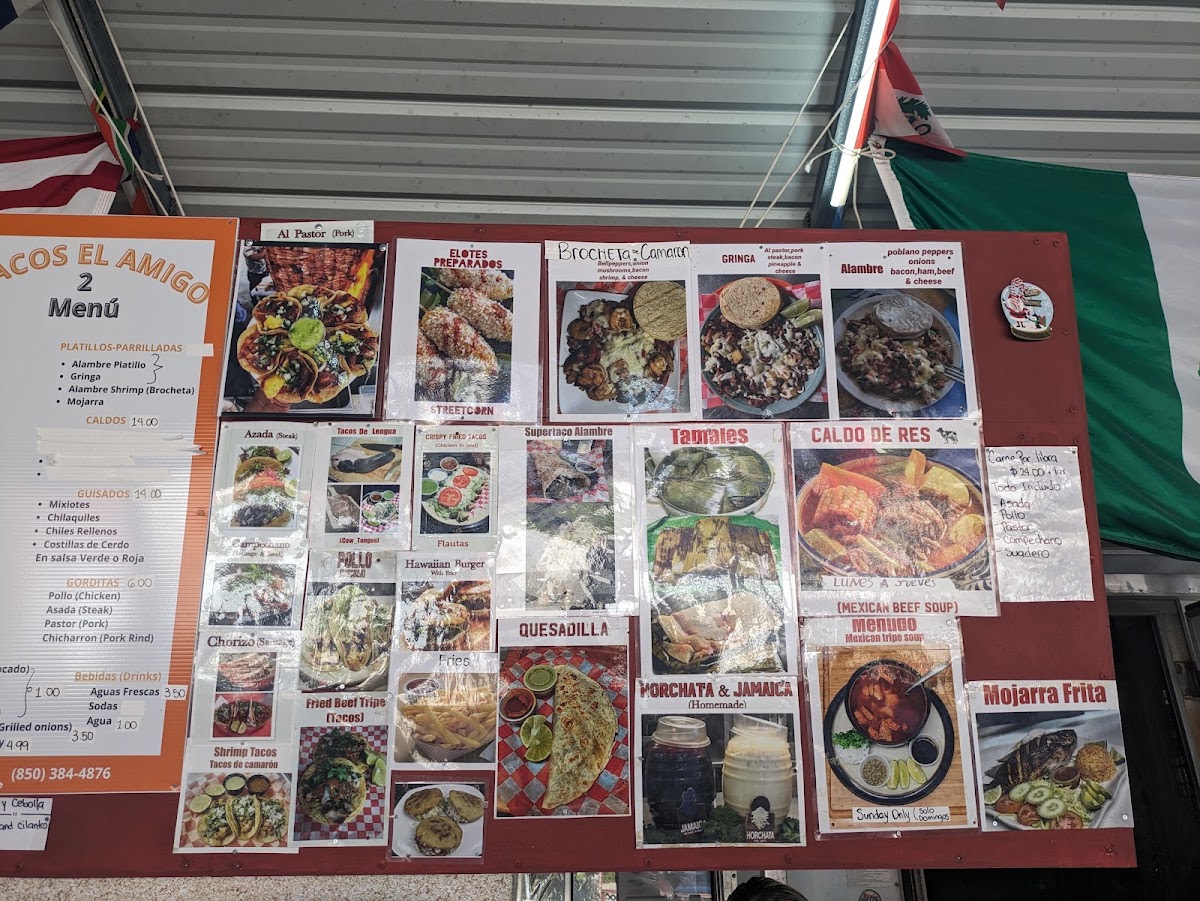 Tacos El Amigo menu board