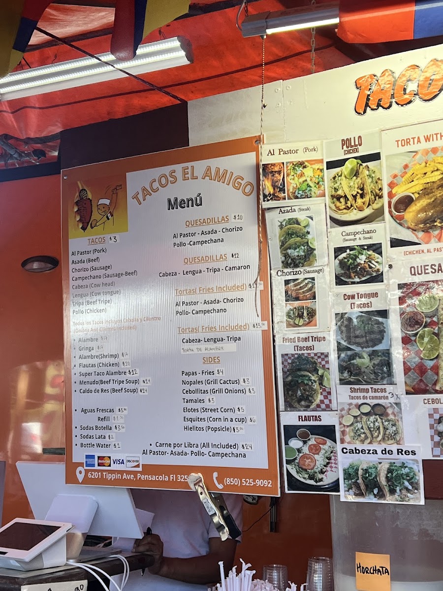 Tacos El Amigo menu board