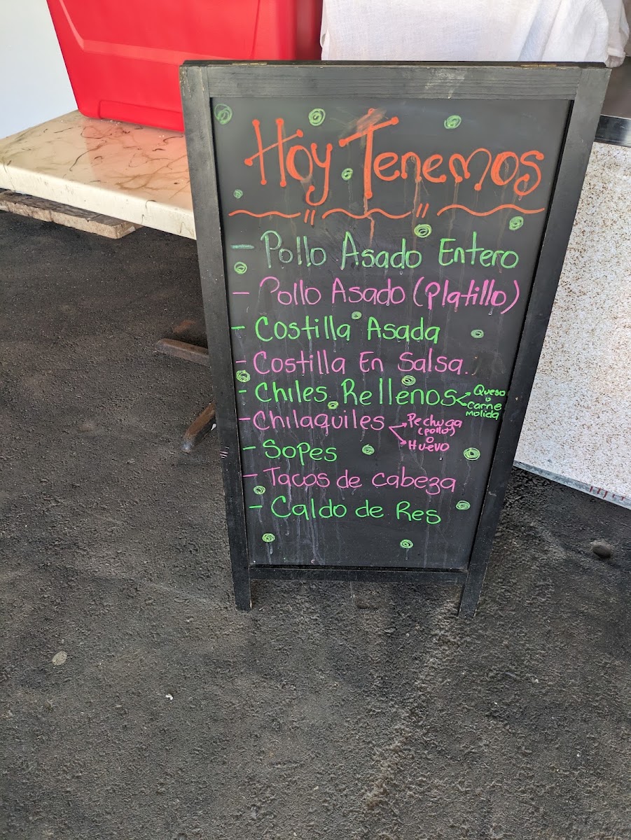 Tacos El Amigo menu board