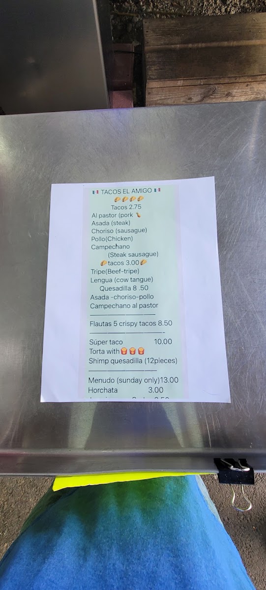 Tacos El Amigo menu board