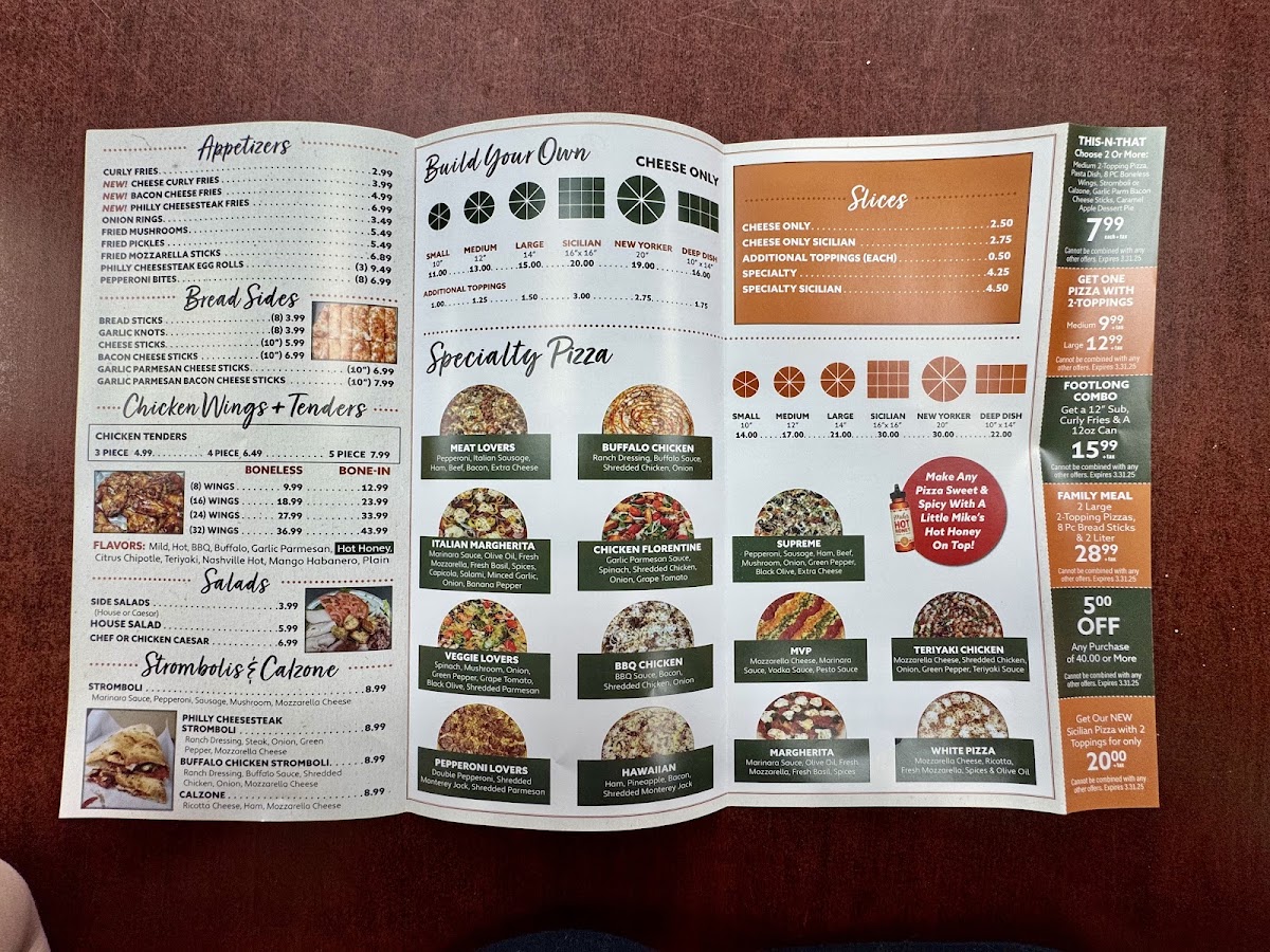Tonito's Pizzeria menu board