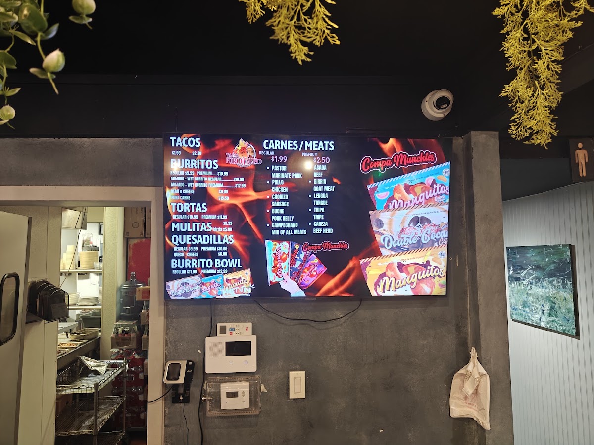 Tacos Puro Jalisco San Bernardino menu board