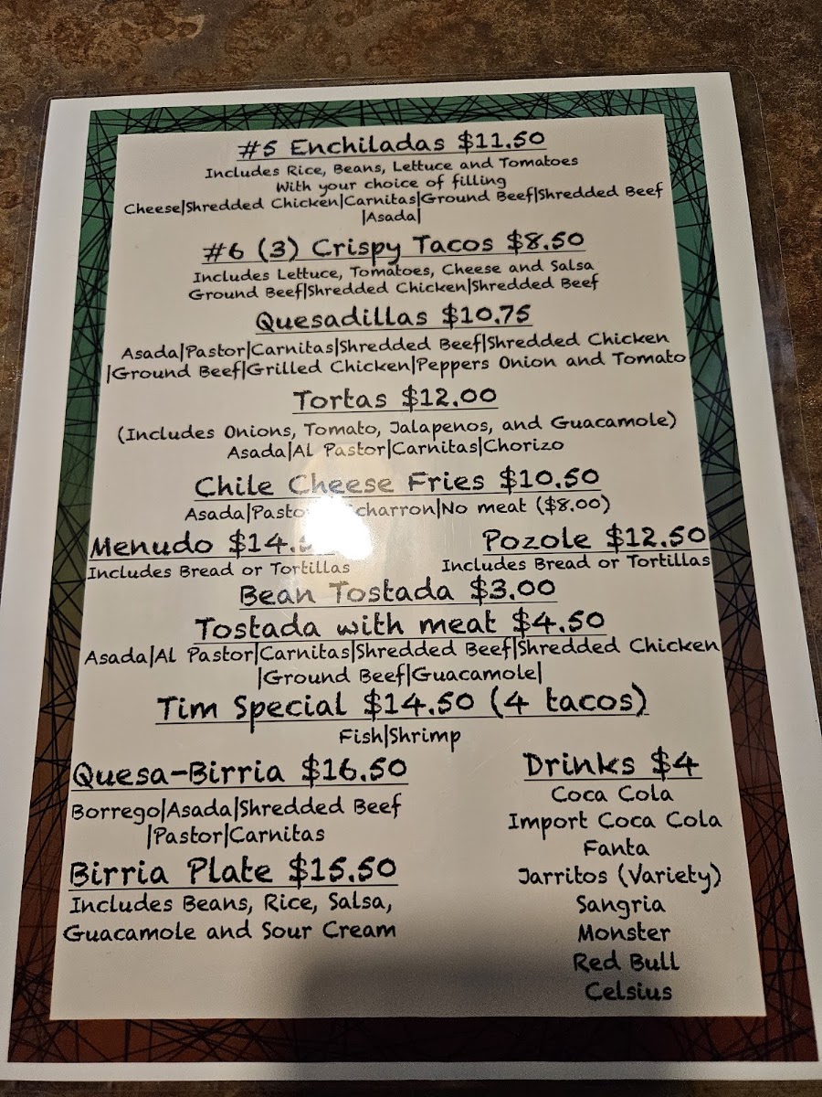 Tacos El Charrito menu board