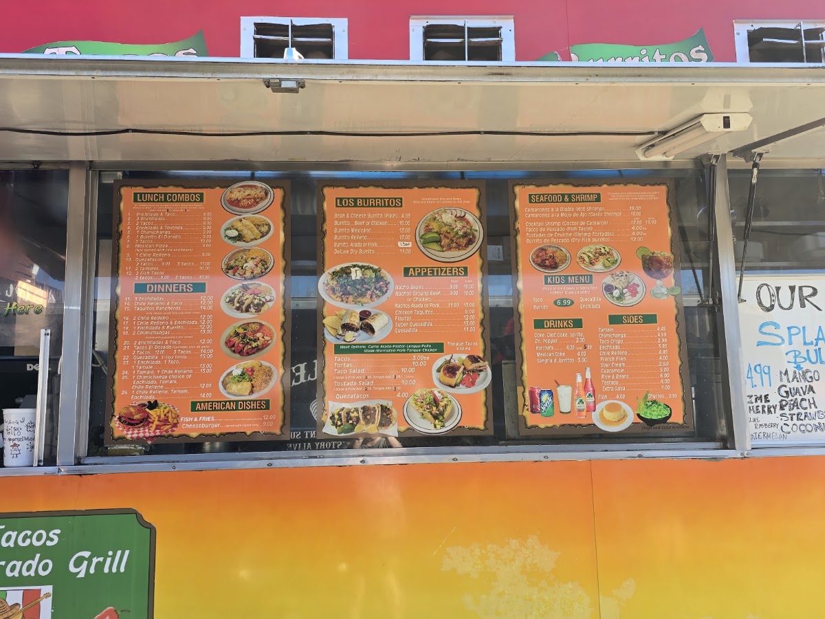 Tacos El Dorado menu board