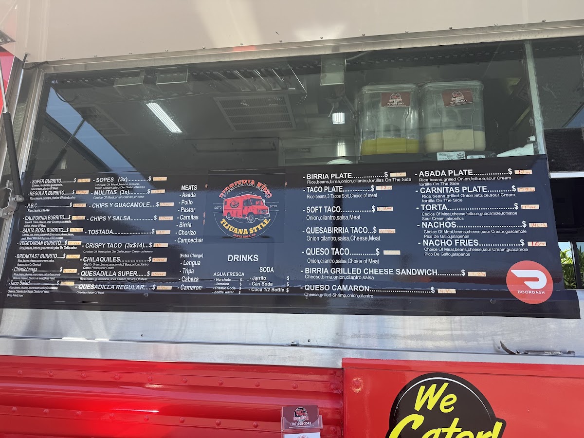 Birrieria king tijuana style menu board