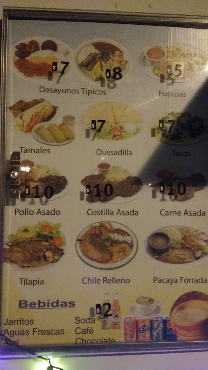 Kely's Taqueria y Pupuseria menu board