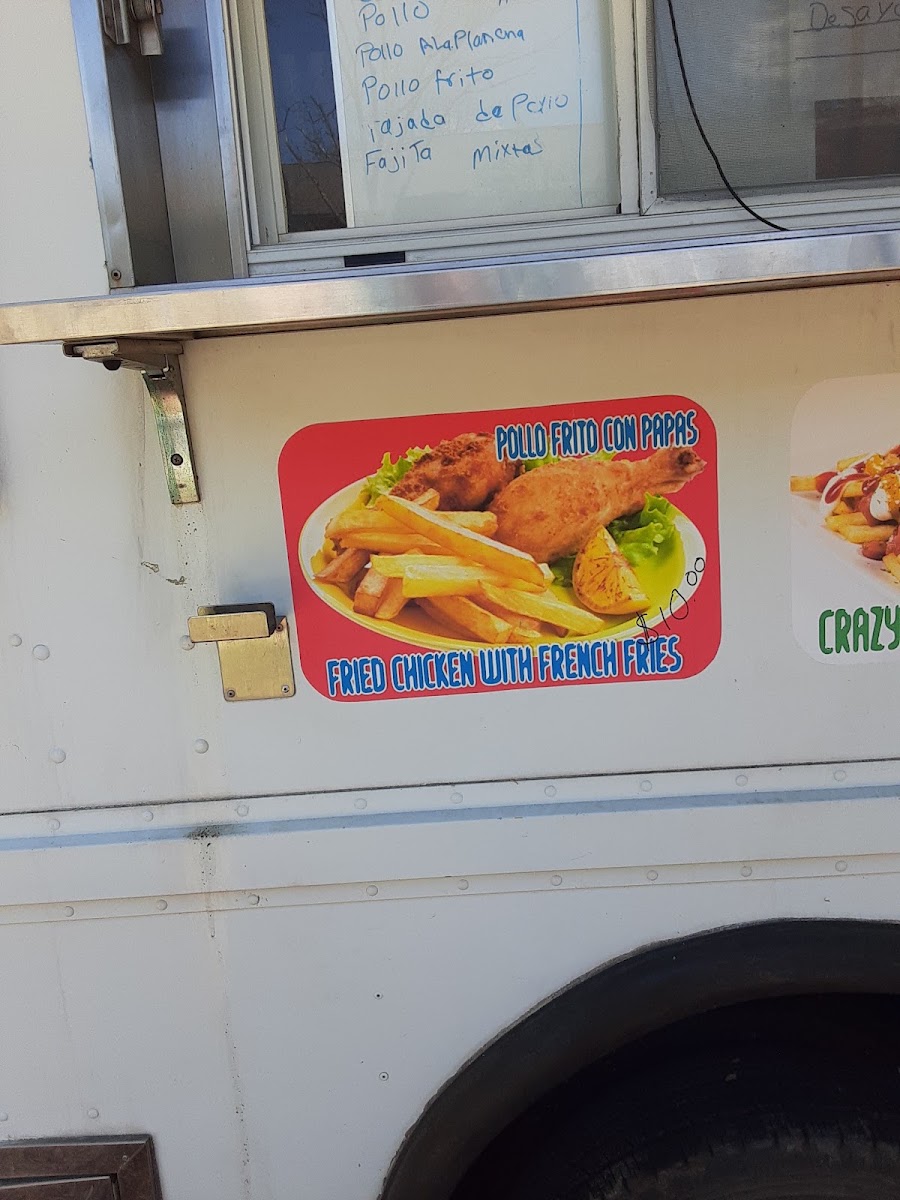 Kely's Taqueria y Pupuseria menu board
