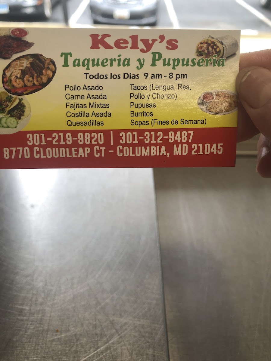 Kely's Taqueria y Pupuseria menu board