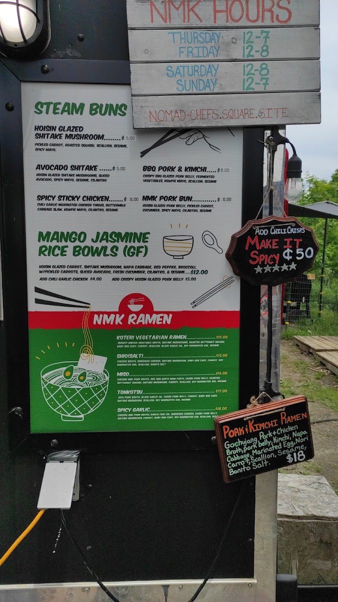 Nomad Buns + Bowls menu board