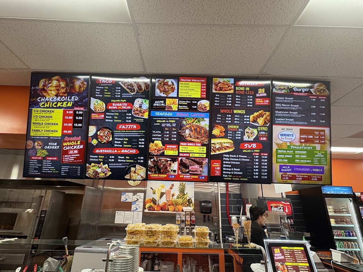 Peruvian Charcoal Chicken and Grill menu board