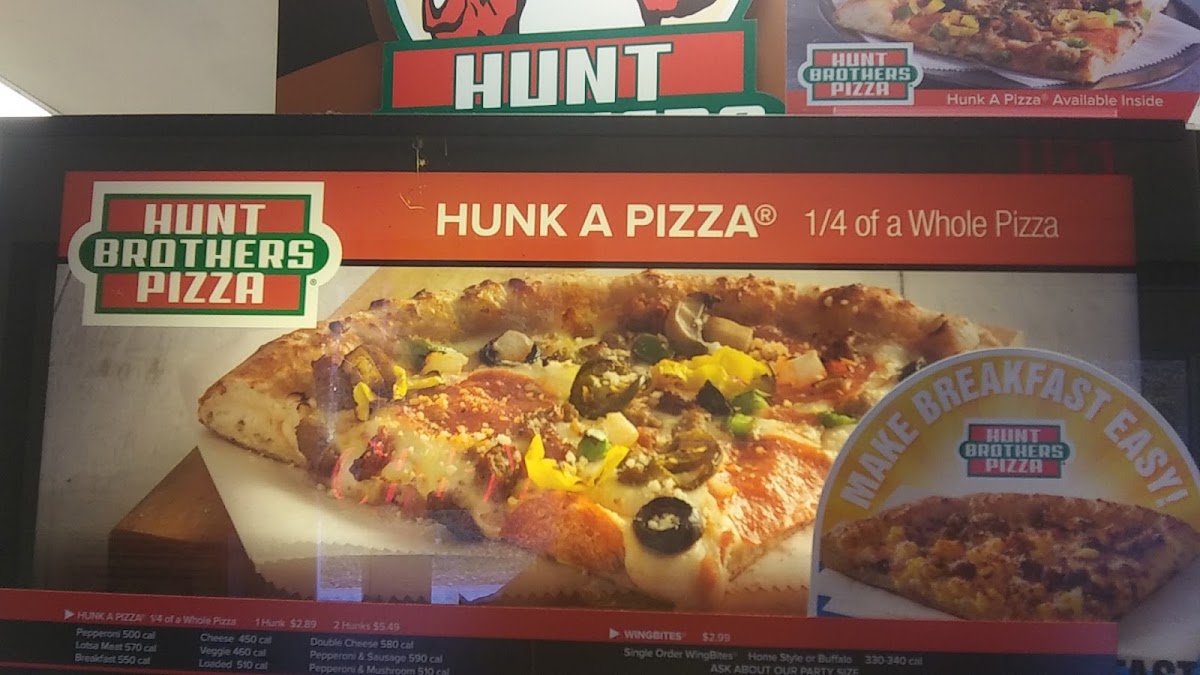 Riverside Pizza menu board