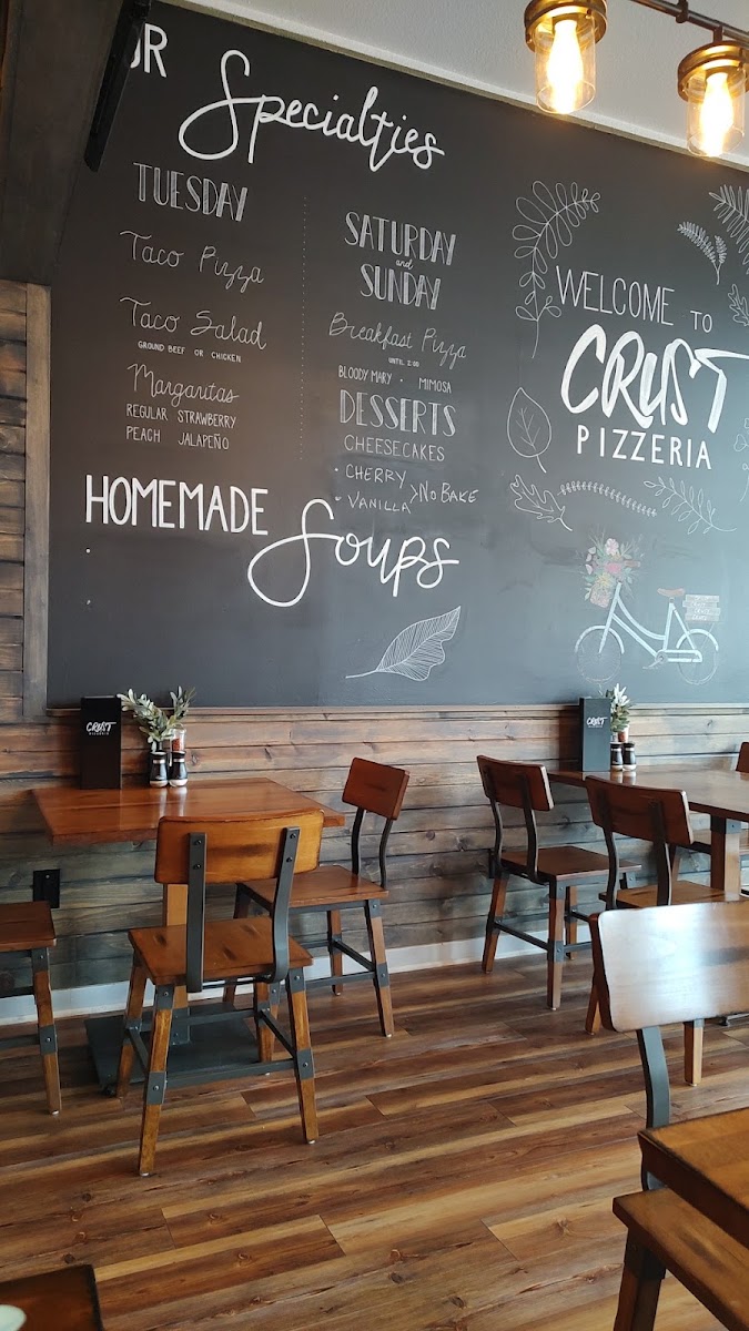 Crust Pizzeria menu board