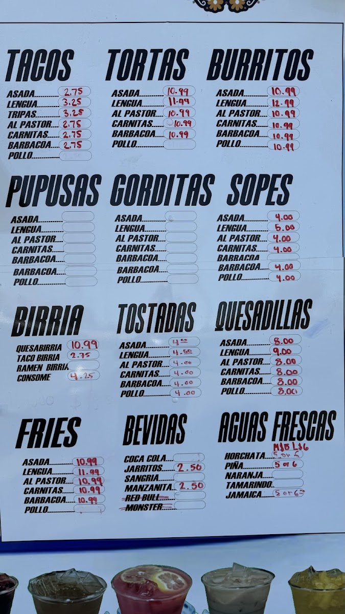 Tacos La Rancherita menu board