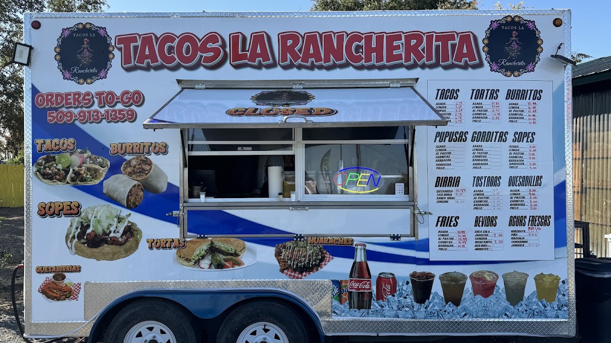 Tacos La Rancherita menu board