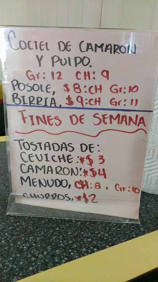 Tacos El Primo menu board
