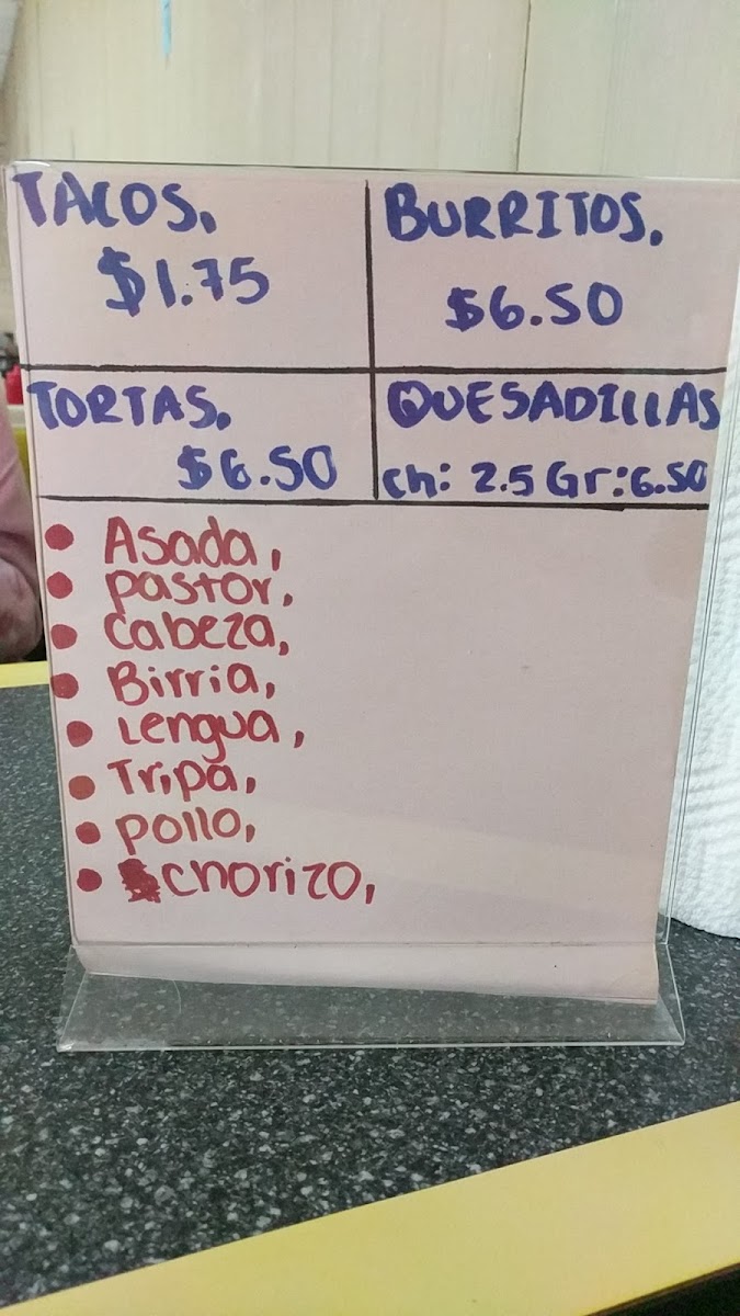 Tacos El Primo menu board