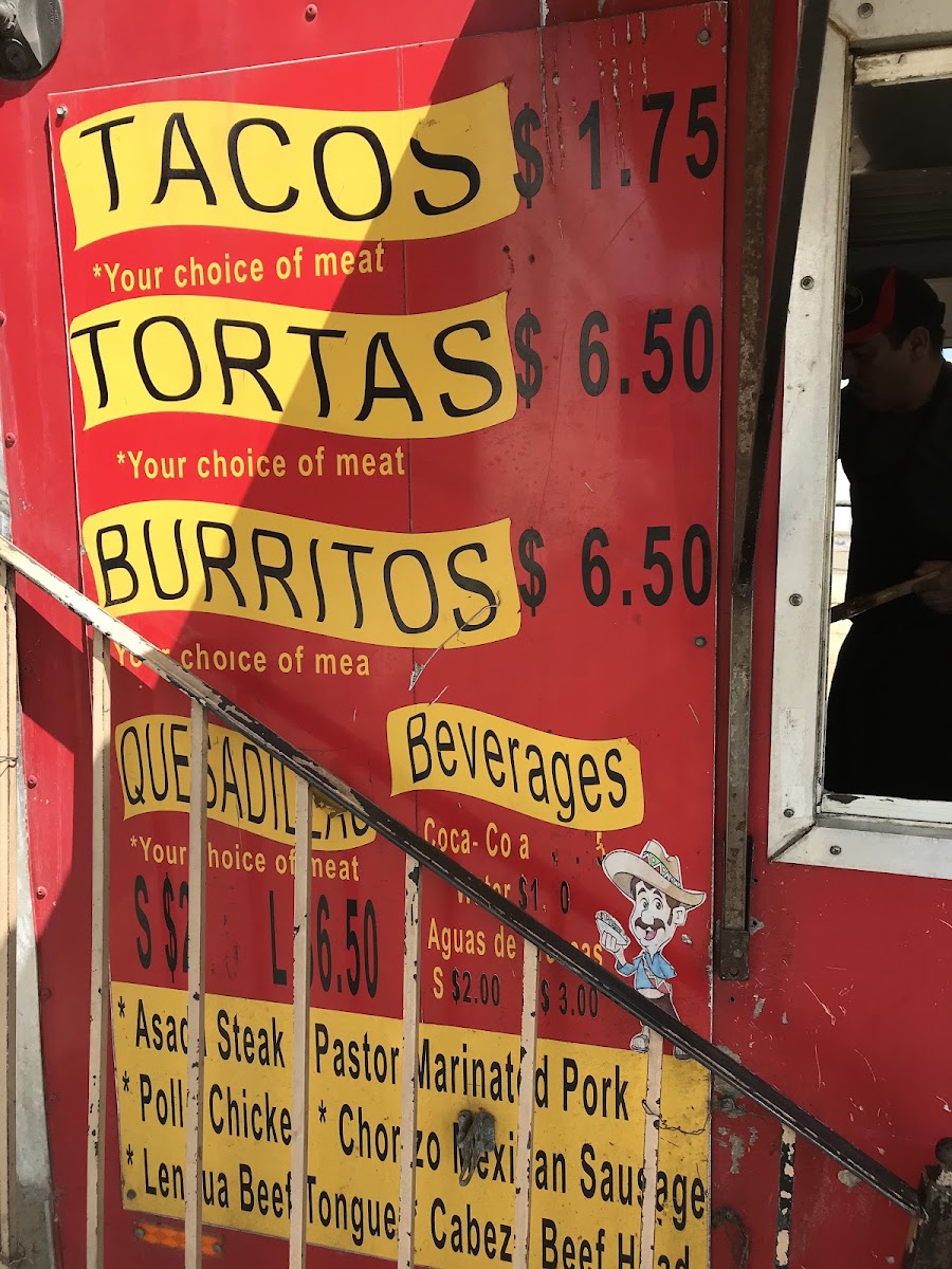 Tacos El Primo menu board