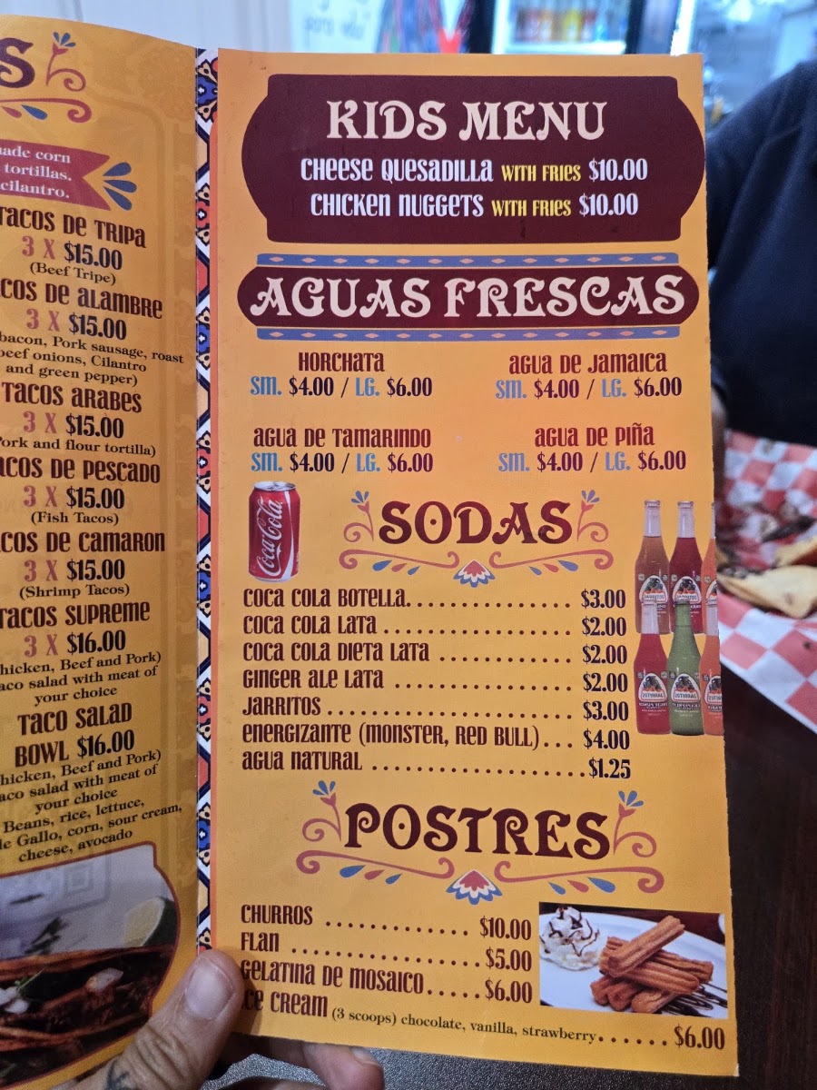 Taqueria La Patrona menu board