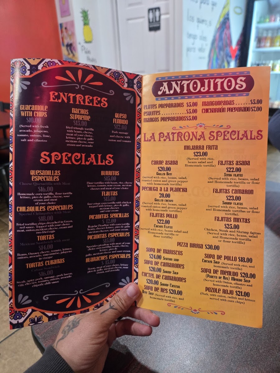Taqueria La Patrona menu board