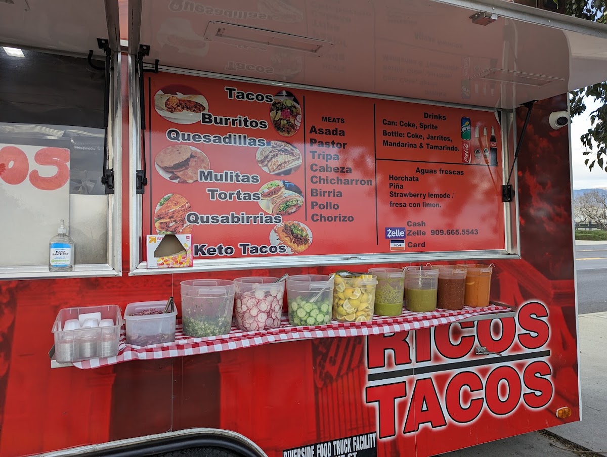 Ricos tacos Latortillera menu board